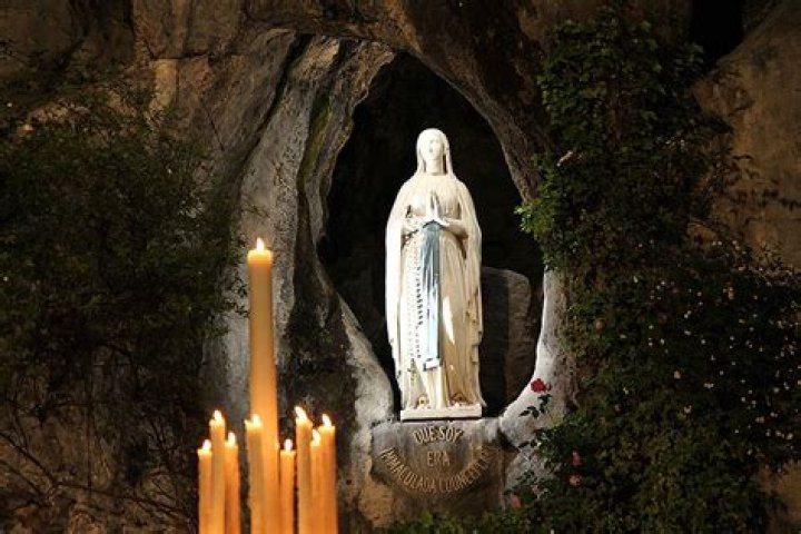 How many confirmed miracles at Lourdes?