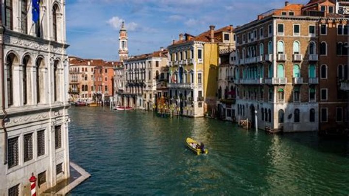 What city is sinking into the ocean?