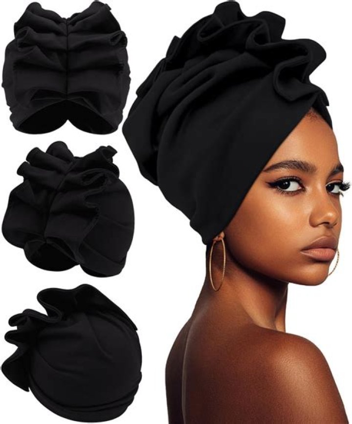 Why did female slaves wear head wraps?